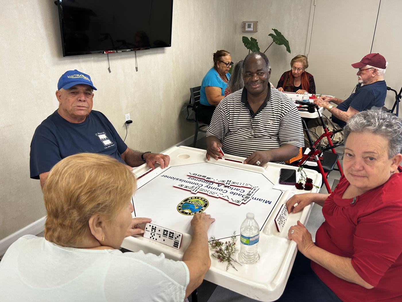 Seniors at a shared table during an art session